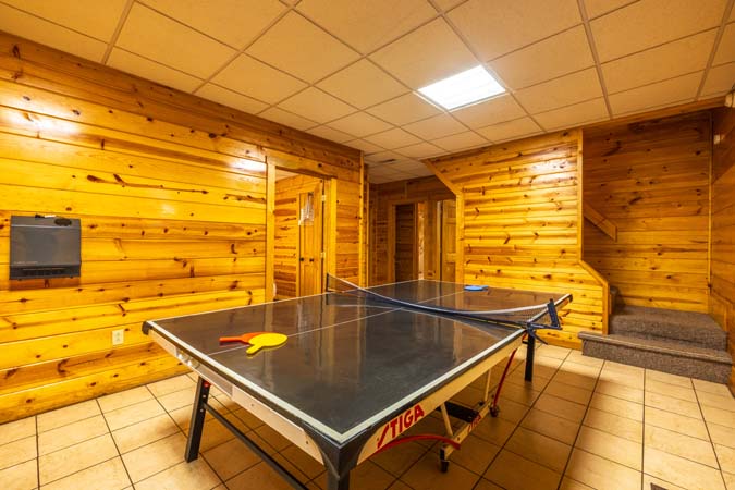 Multiple decks overlooking woods at Cardinal Cabin