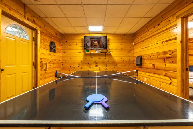 Wooded hillside views from Cardinal Cabin decks