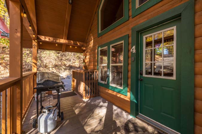 Large screen HD TV in great room at Chickadee Cabin