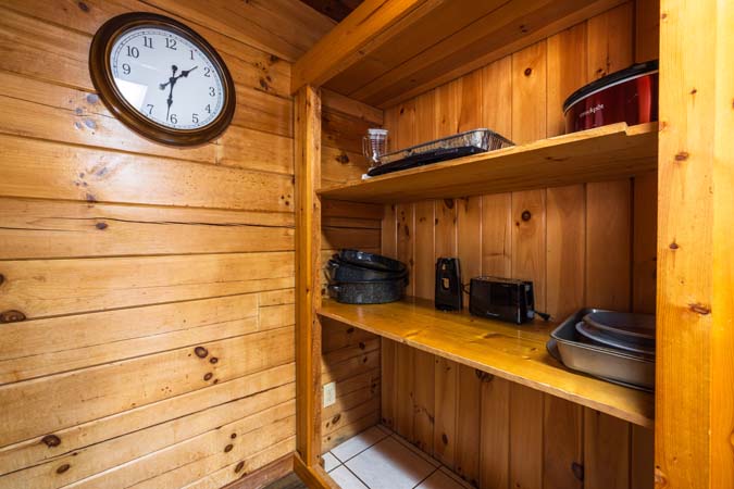 Spacious loft overlooking living area at Chickadee Cabin