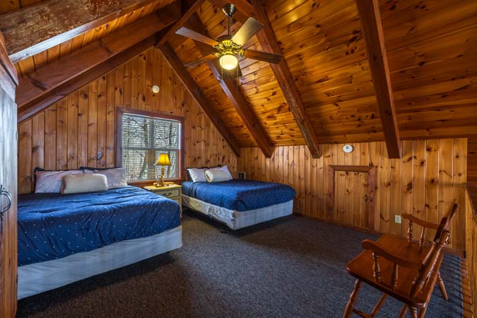 Evening fire pit gathering at Chickadee Cabin