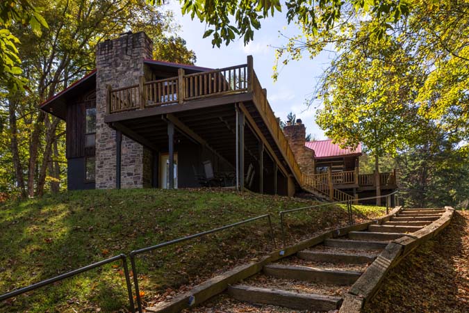 High Point Lodge surrounded by trees and open lawn