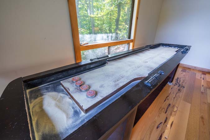 Wrap around porch overlooking lawn at High Point Lodge