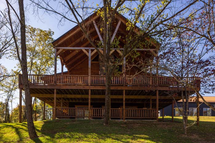 Rear exterior of Highland Lodge with two-story deck