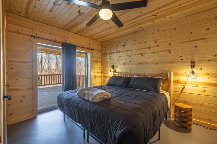 Bedroom with king bed and ceiling fan