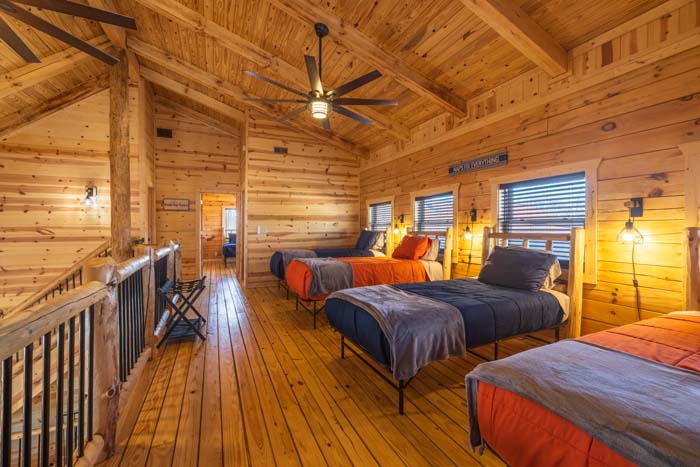 Loft bedroom with three queen beds