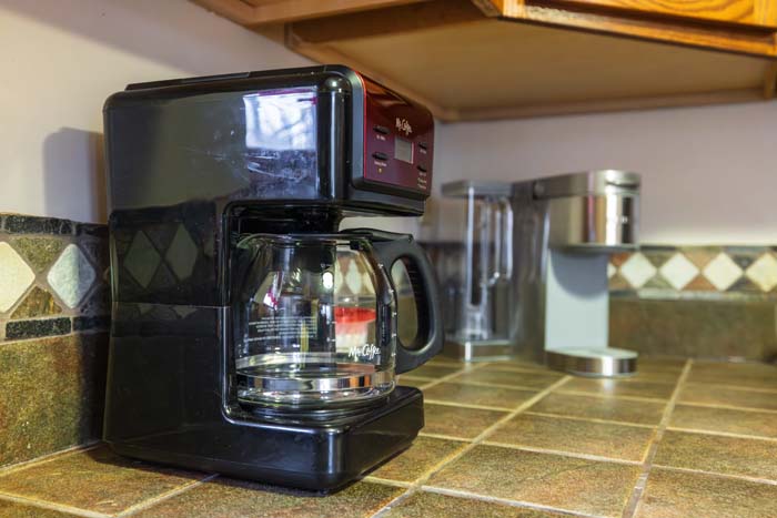 Coffee maker on the tile counter