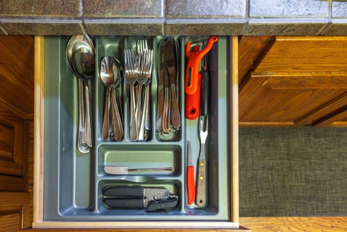 Silverware drawer with flatware and utensils