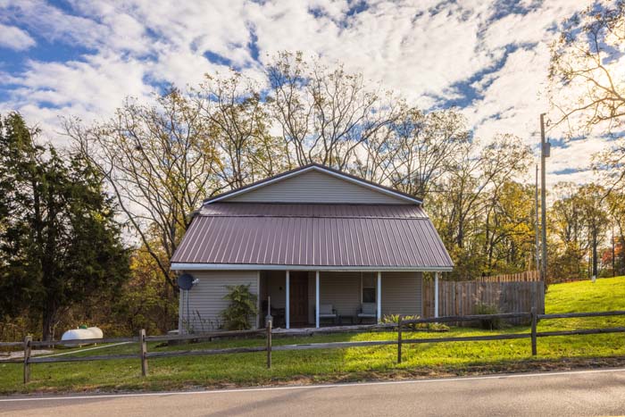 Hiker's Hideout exterior across the road in autumn