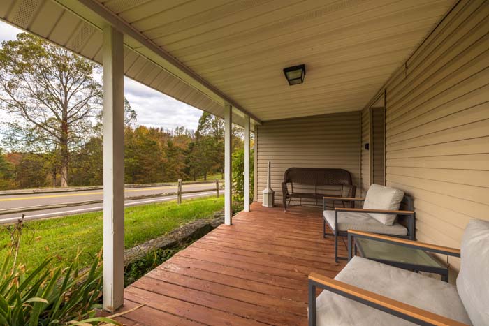 Covered front porch with country road views