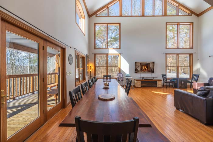 Spacious indoor pool area with large windows and views