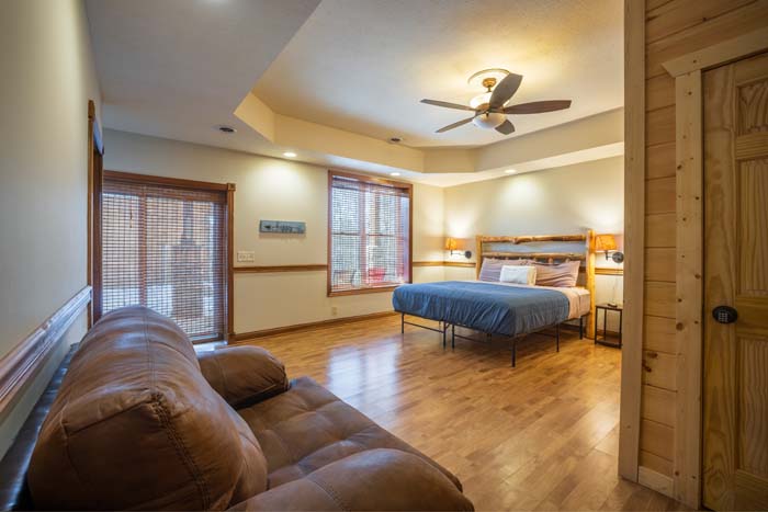 Deck overlooking pond area and wooded landscape