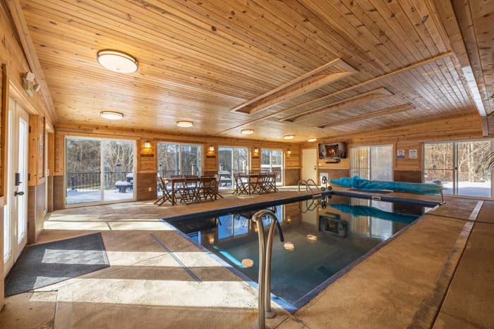 Hilltop home with scenic views and surrounding land