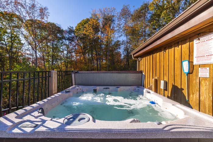 Hilltop home with large deck and scenic countryside landscape