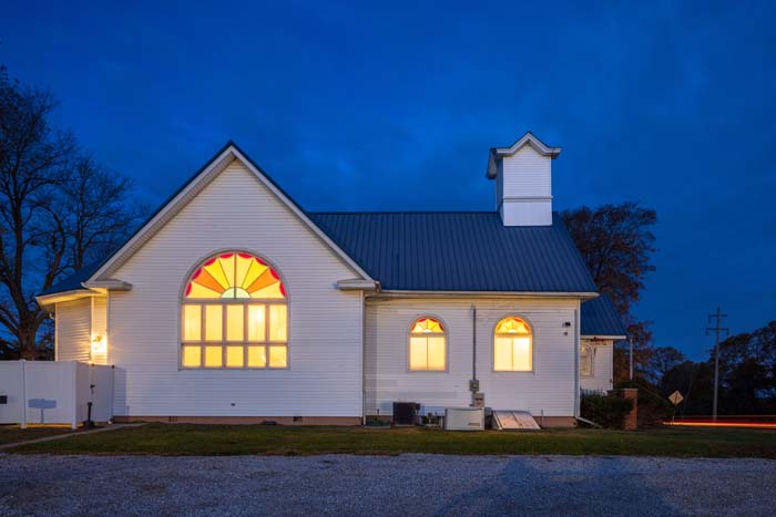 Historic church exterior converted into Dragonfly Inn vacation rental near Hocking Hills