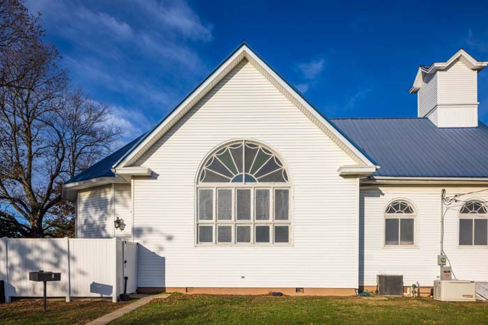 Bathroom with walk-in shower and stone tile detail
