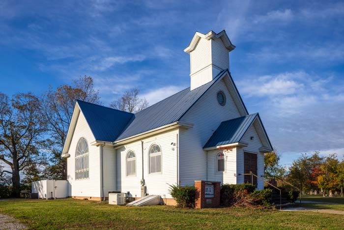 Loft with six extra-long twin beds overlooking great room