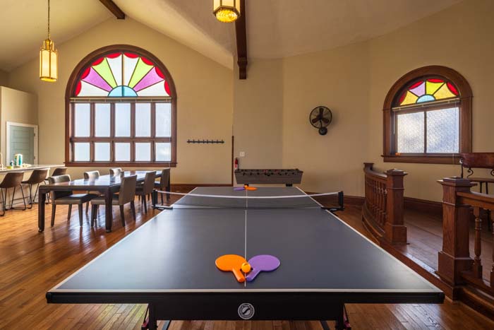 Hallway view leading to bedrooms at Dragonfly Inn