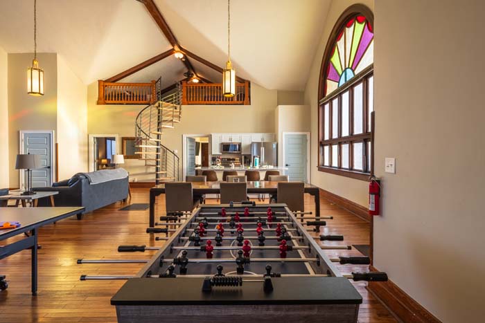 Arcade game table in corner of living space