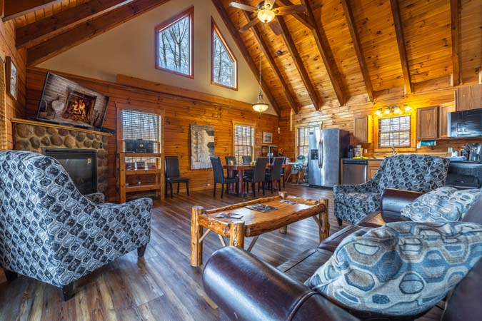 Spacious loft overlooking living area at Mockingbird Cabin