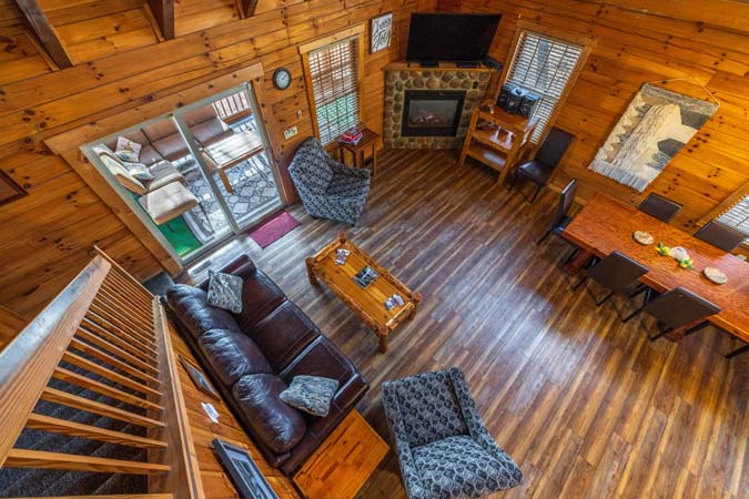 Evening fire pit gathering at Mockingbird Cabin