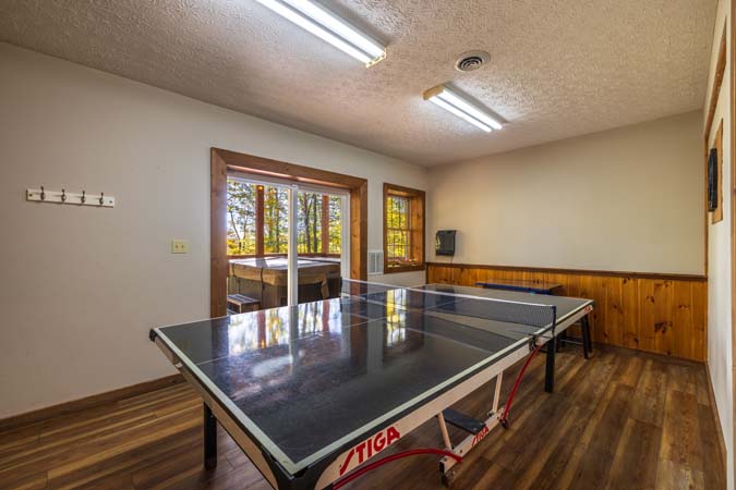 Propane and charcoal grill area at Mockingbird Cabin