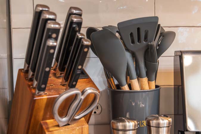 Kitchen cabinetry and counters at Onyx Outpost
