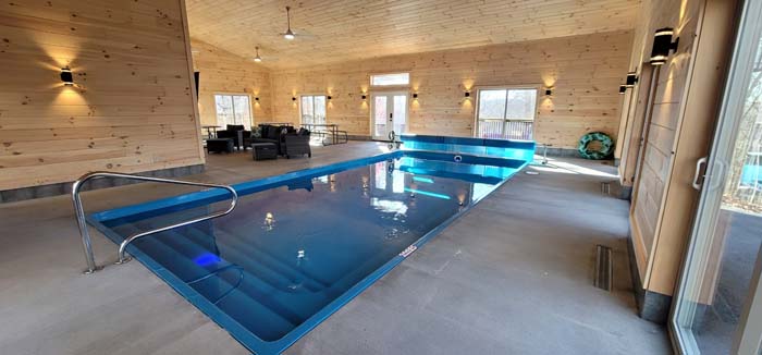Inviting indoor heated pool oasis