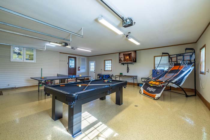 Game room with pool table, ping-pong, and basketball arcade
