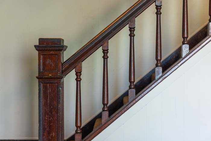 Original wood staircase and railing