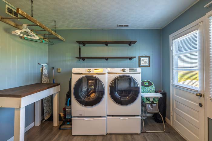 Laundry room with full-size washer and dryer