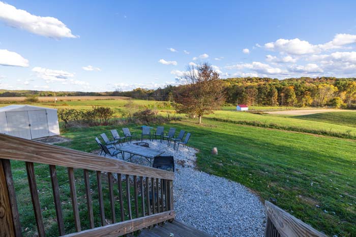 Deck hot tub overlooking the open field