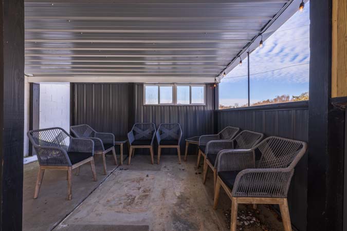 Great room featuring seventy five inch TV at The Grange