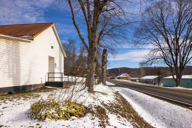 Large covered patio overlooking countryside at The Grange