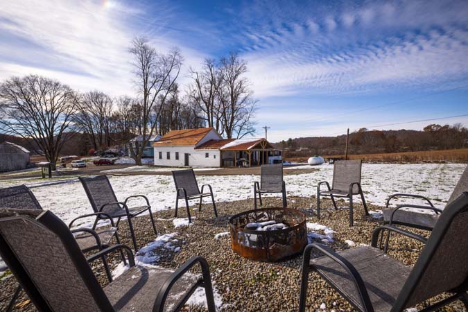 Fire pit area for outdoor gatherings at The Grange