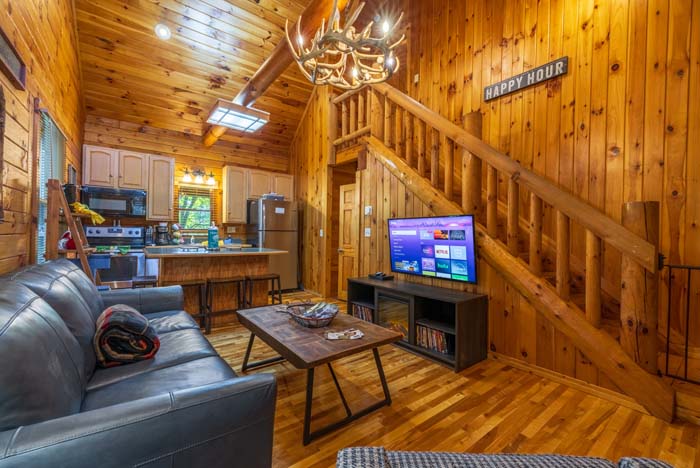 Bedroom with smart TV and ceiling fan
