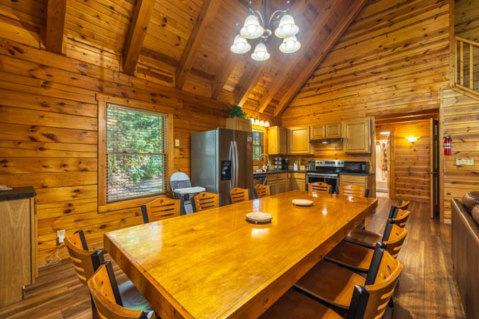 Loft sleeping area with queen beds at Catbird Cabin