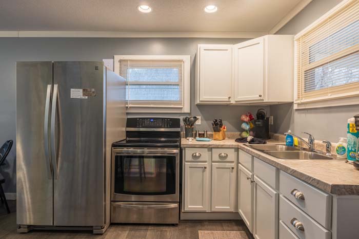 Second bedroom with smart TV and decor