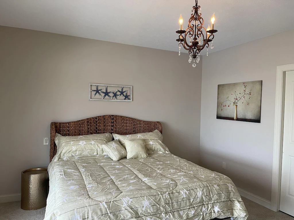 bedroom with chandelier