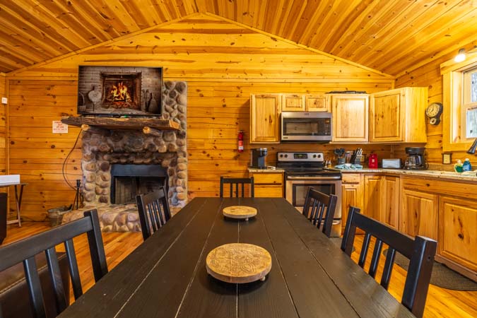 Evening fire pit gathering at Little Pine Cabin