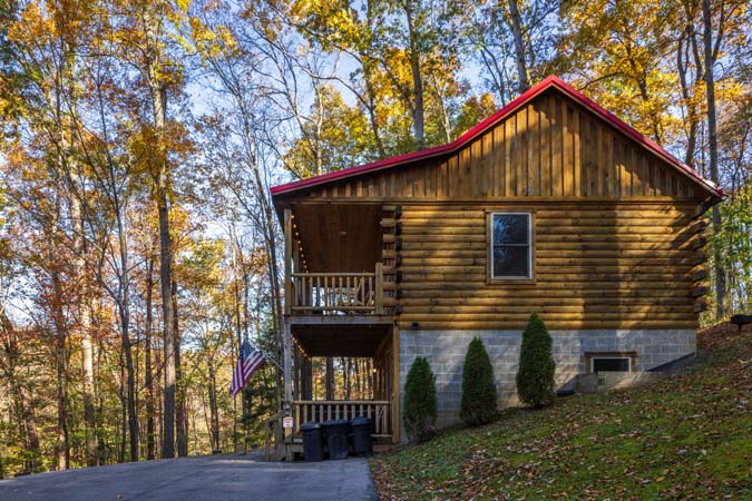 Covered porch seating at Little Pine Cabin