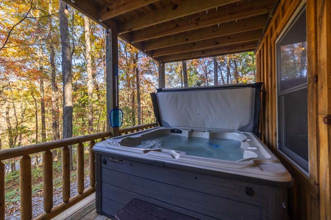 Private hot tub just outside cabin at Little Pine Cabin