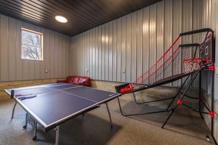 Deck seating area overlooking woods