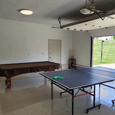 ping pong table and pool table in garage