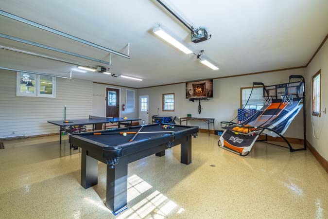 Outdoor seating on covered deck at Ruby Farmhouse