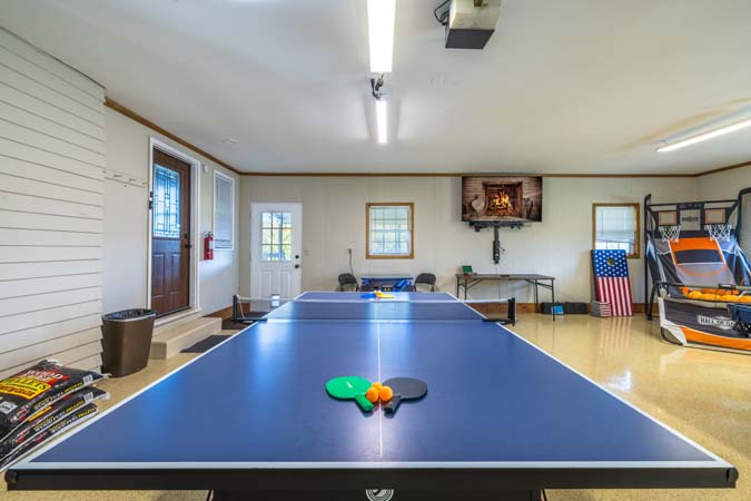 Covered deck overlooking countryside at Ruby Farmhouse